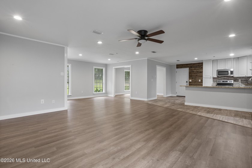 Enjoy waterfront living in this 3-bedroom, 2-bath home located - photo 8