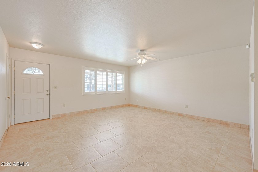 Welcome to this charming 2-bedroom, 1-bath home nestled in the - photo 2