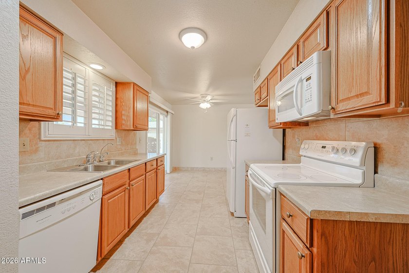 Welcome to this charming 2-bedroom, 1-bath home nestled in the - photo 3