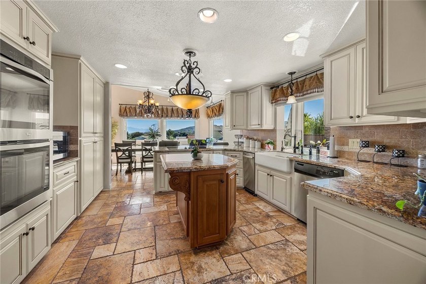 Welcome to this stunning custom-built home in the highly - photo 17