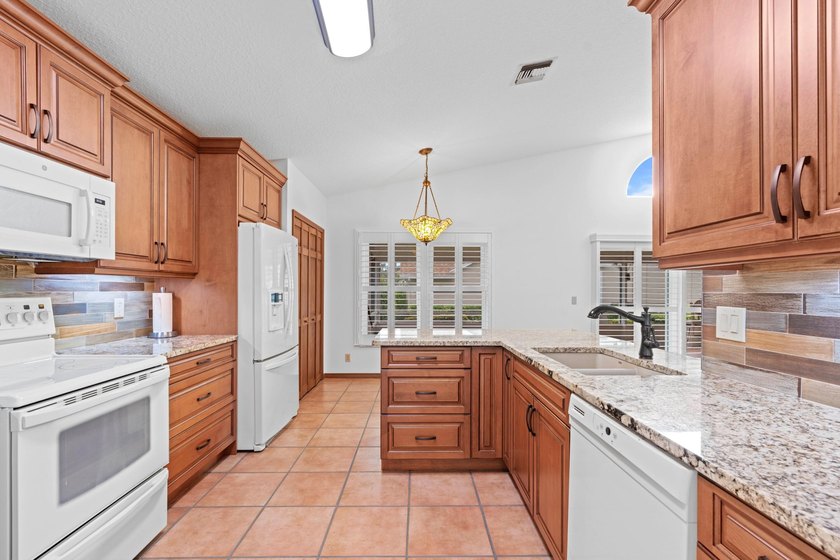 LOWEST PRICED HOME IN WOODS WALK, lovingly maintained by its - photo 12