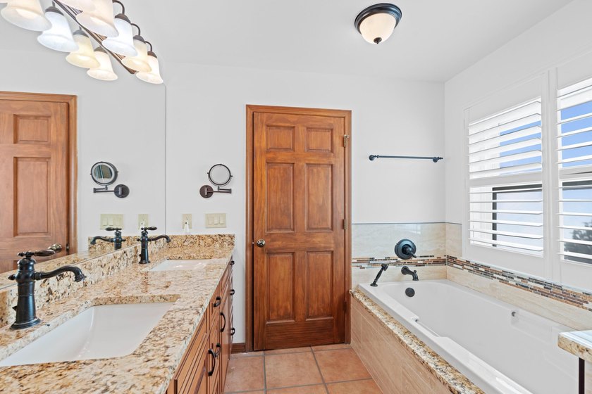 LOWEST PRICED HOME IN WOODS WALK, lovingly maintained by its - photo 18