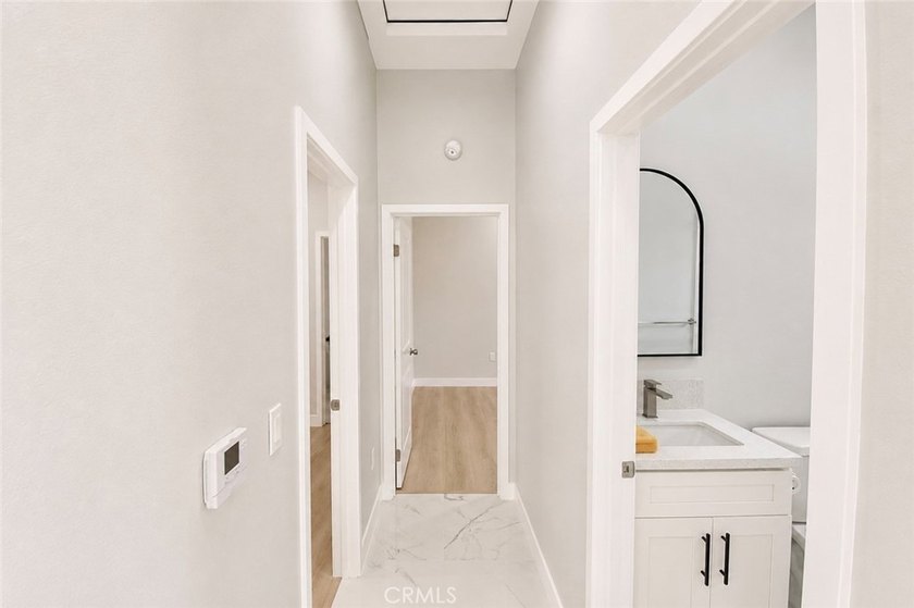 Beautifully updated property featuring a 4-bedroom, 2-bath main - photo 15
