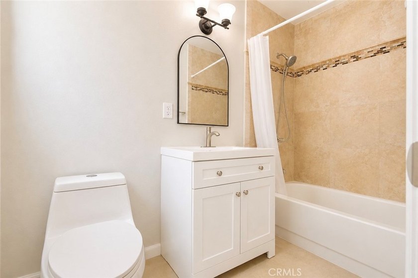 Beautifully updated property featuring a 4-bedroom, 2-bath main - photo 18