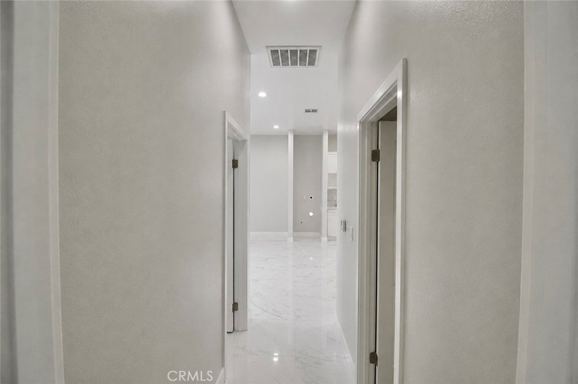 Beautifully updated property featuring a 4-bedroom, 2-bath main - photo 29