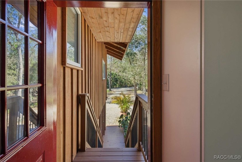 Architecturally distinctive cedar-sided post-and-beam home - photo 9