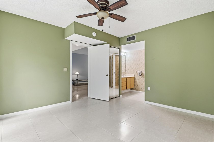 This inviting first-floor, two-bedroom, two-bath condo offers a - photo 12
