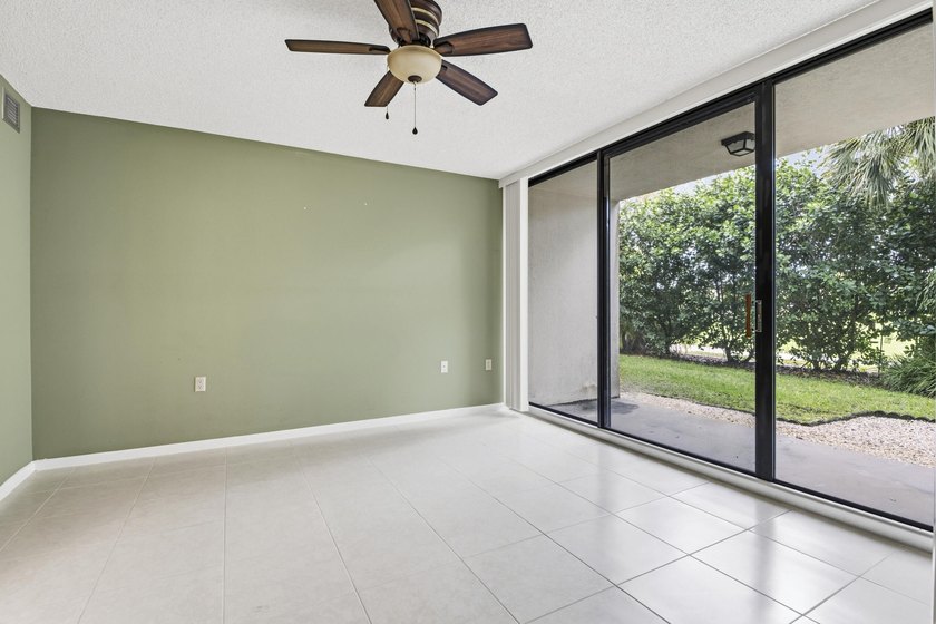 This inviting first-floor, two-bedroom, two-bath condo offers a - photo 13