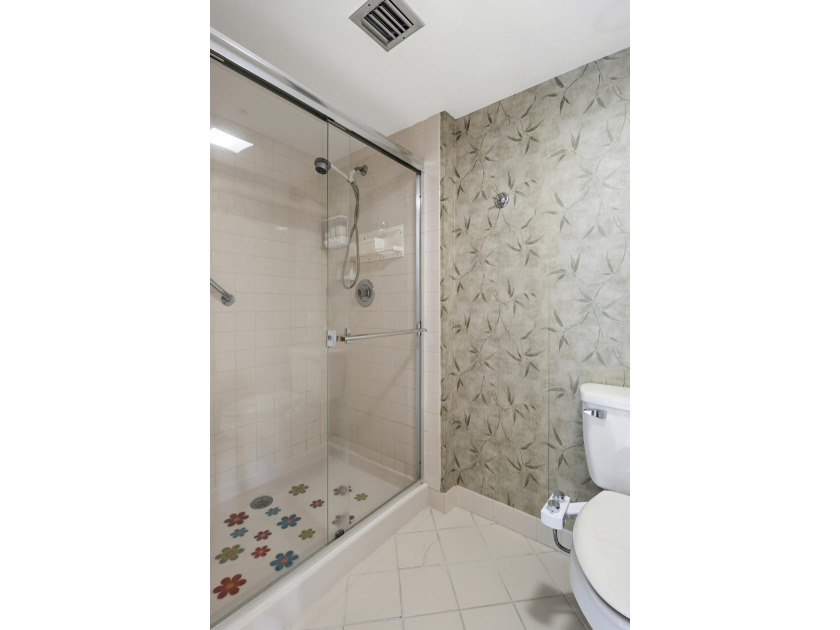 This inviting first-floor, two-bedroom, two-bath condo offers a - photo 14