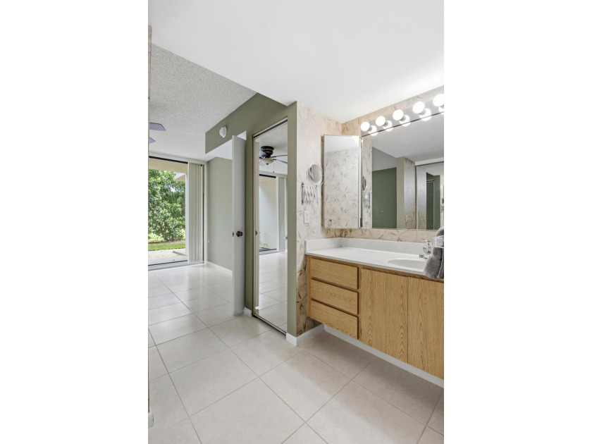 This inviting first-floor, two-bedroom, two-bath condo offers a - photo 16