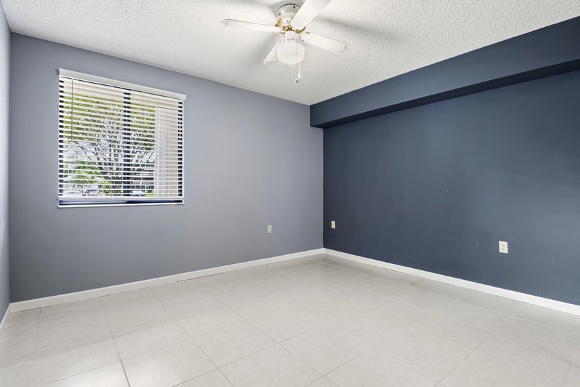This inviting first-floor, two-bedroom, two-bath condo offers a - photo 19
