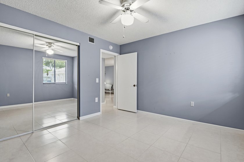 This inviting first-floor, two-bedroom, two-bath condo offers a - photo 20