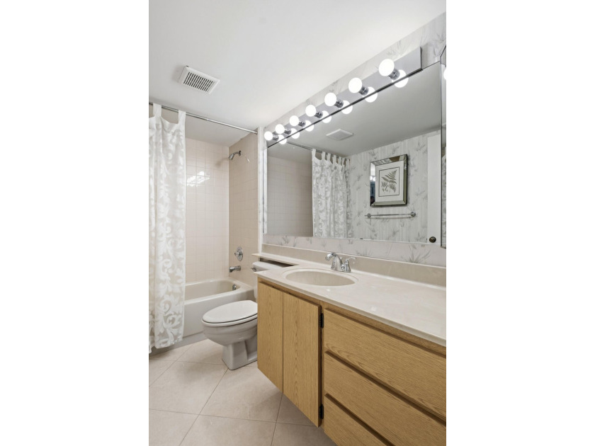 This inviting first-floor, two-bedroom, two-bath condo offers a - photo 21