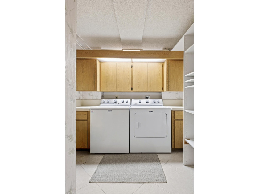 This inviting first-floor, two-bedroom, two-bath condo offers a - photo 22