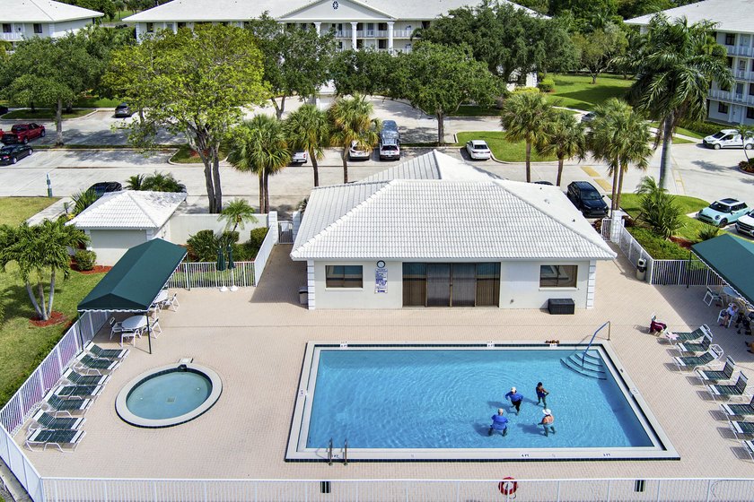 This inviting first-floor, two-bedroom, two-bath condo offers a - photo 28