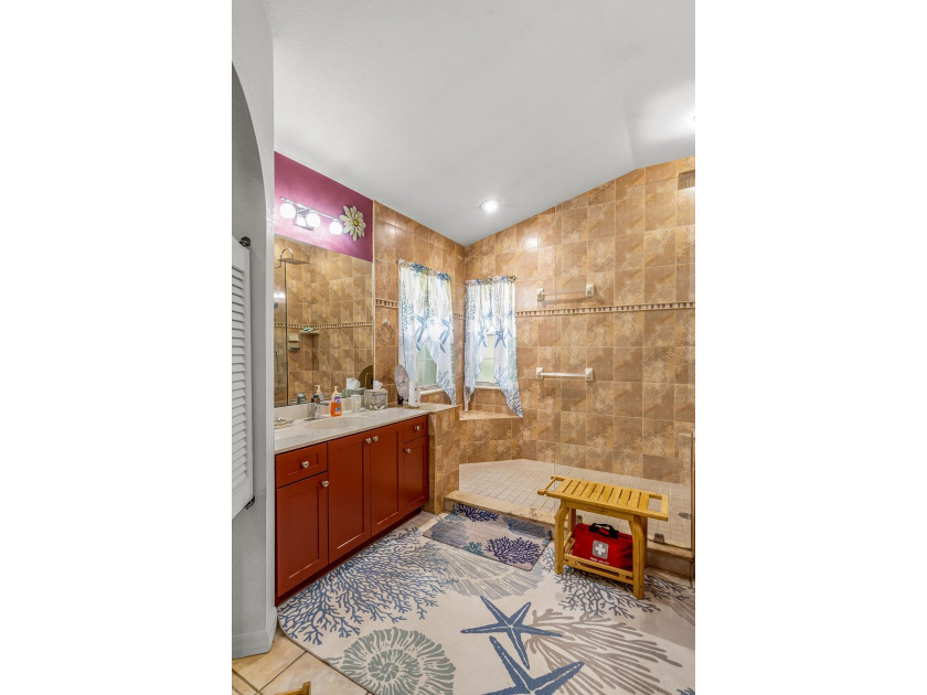 For sale for the first time, this custom built, lake front, pool - photo 37