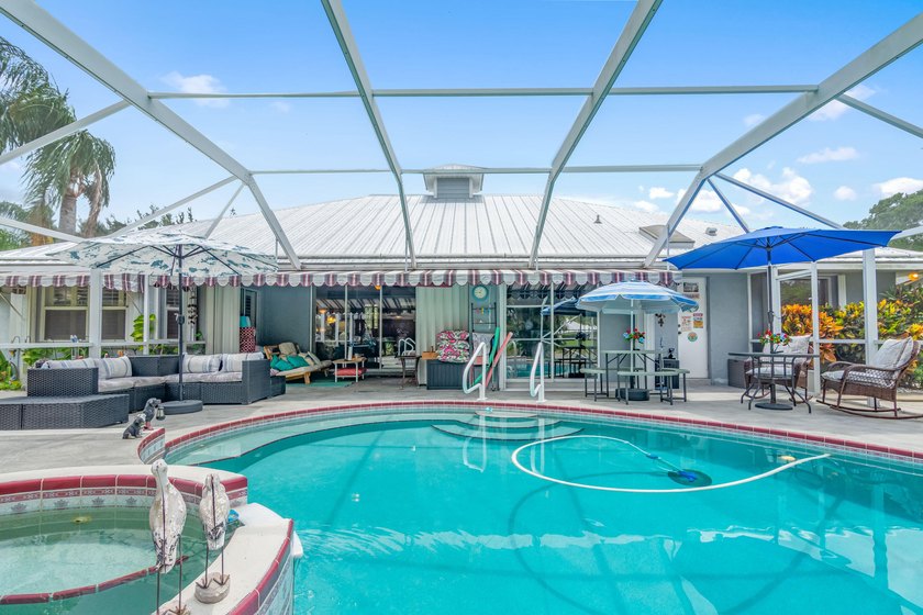 For sale for the first time, this custom built, lake front, pool - photo 47