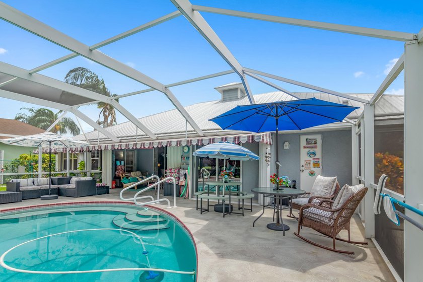 For sale for the first time, this custom built, lake front, pool - photo 49