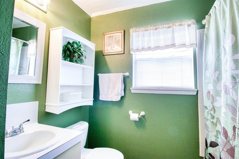 Welcome to this well-maintained 3-bedroom, 2-bath home that - photo 12