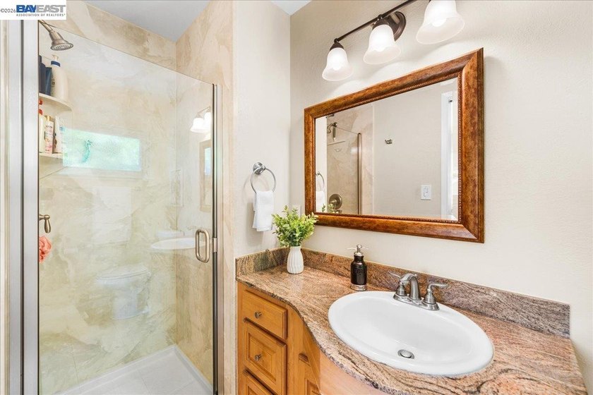 Freshly updated with new interior and exterior paint, the home - photo 22