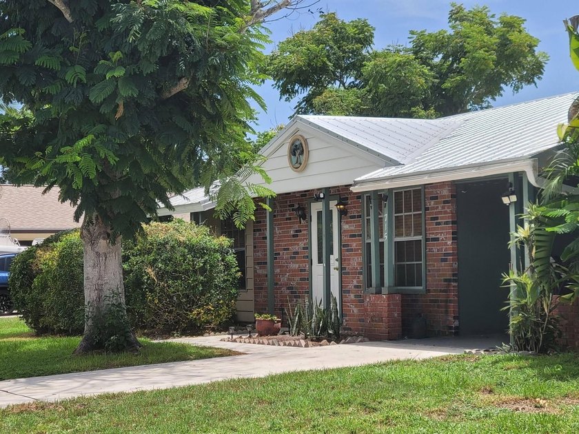 Welcome to this charming concrete block home in desirable - photo 2