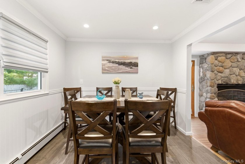 Welcome to this beautifully updated L-Shaped Ranch nestled in - photo 12