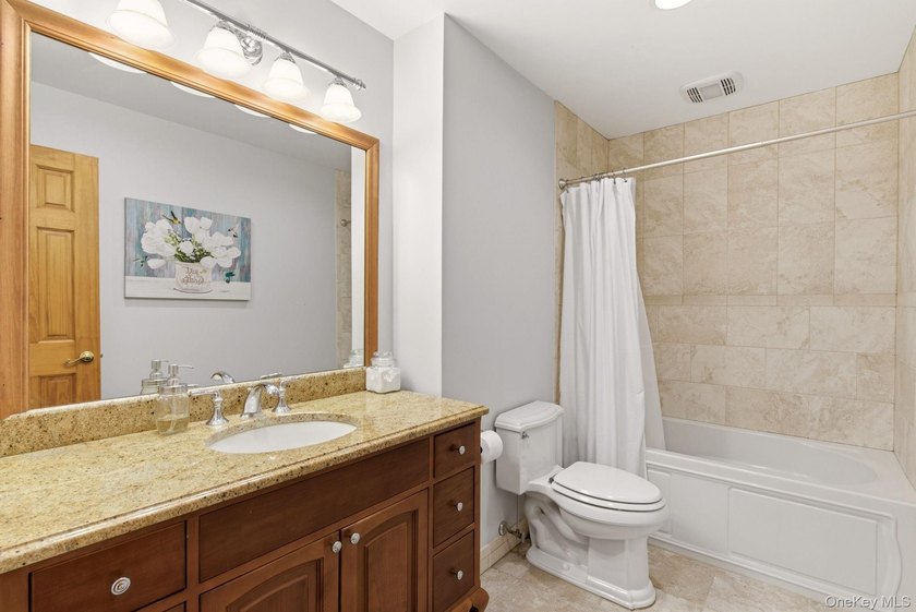 Welcome to this beautifully updated L-Shaped Ranch nestled in - photo 18