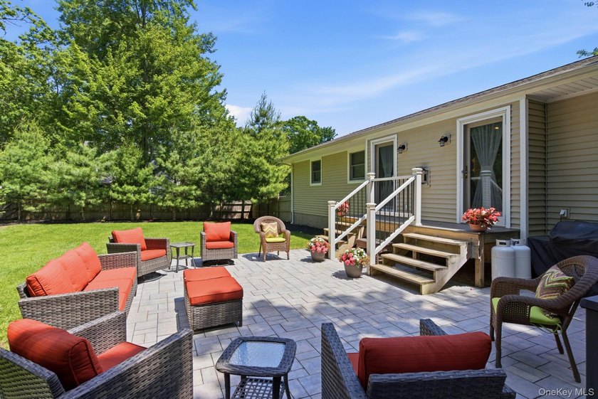 Welcome to this beautifully updated L-Shaped Ranch nestled in - photo 25