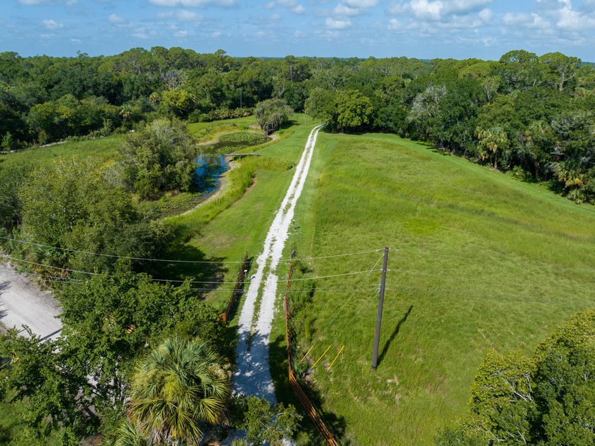 Just listed, this property offers the perfect blend of secluded - photo 6