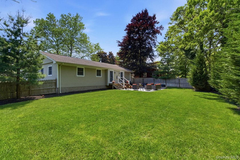 Welcome to this beautifully updated L-Shaped Ranch nestled in - photo 28