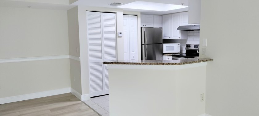 Step into this beautifully renovated 2-bedroom,2-master suite - photo 7