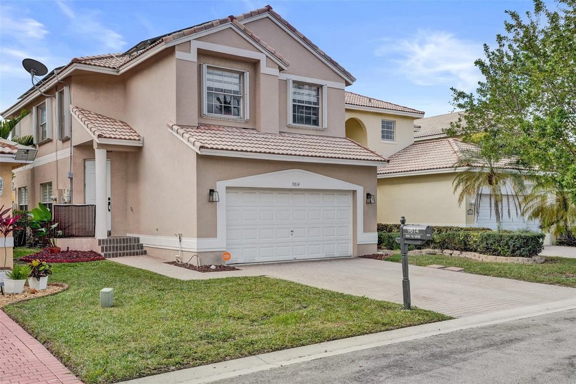 This beautifully updated 4BR/2.5BA waterfront home offers serene - photo 2