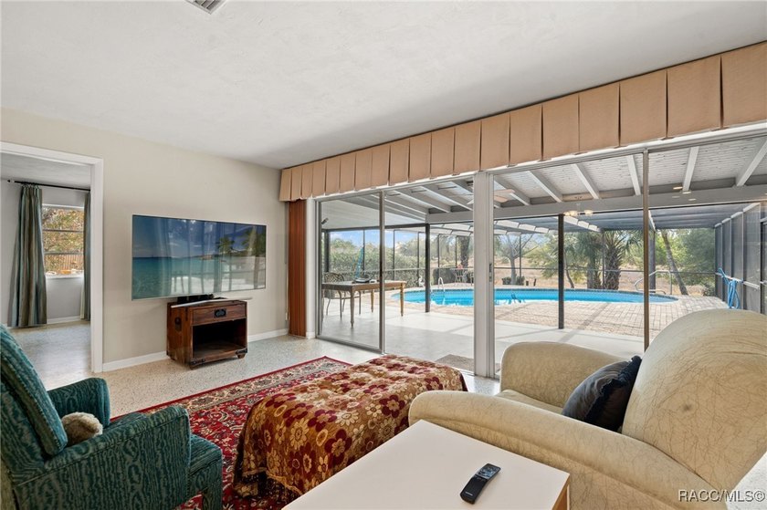 Move-in ready pool home featuring 3 bedrooms and 2 baths with a - photo 3