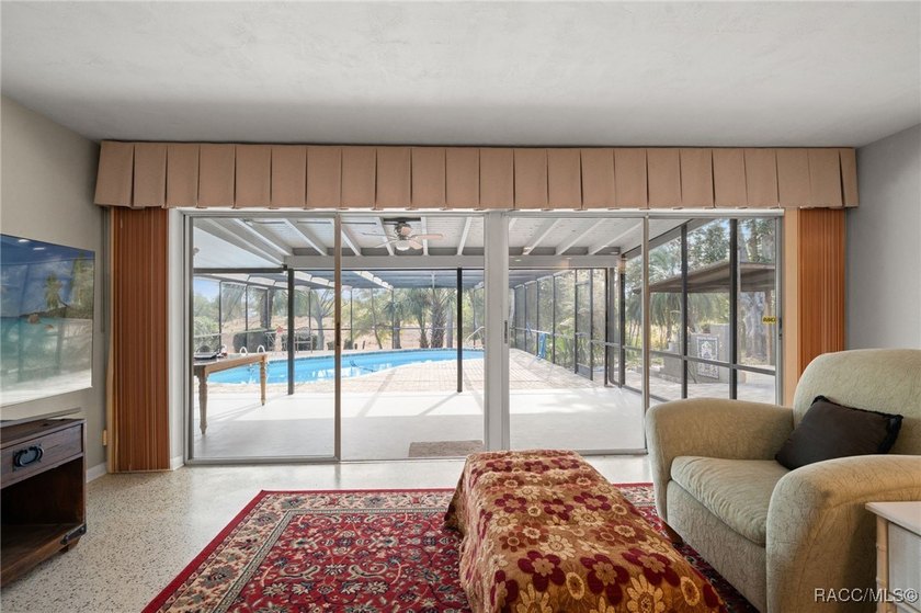 Move-in ready pool home featuring 3 bedrooms and 2 baths with a - photo 4