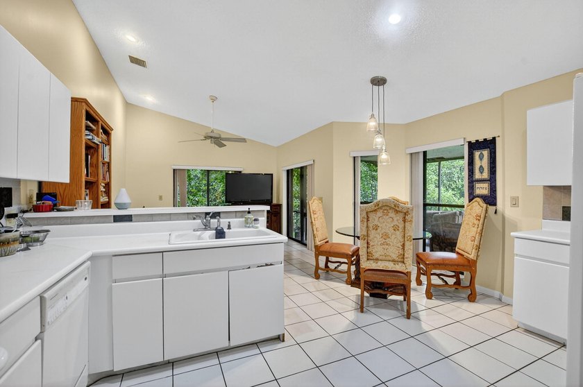 This wonderfully designed single-story home features a highly - photo 12