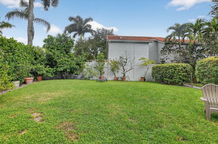 This wonderfully designed single-story home features a highly - photo 32