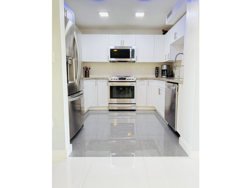 Priced Right! Cash it out with this turnkey 4th floor Highrise - photo 5