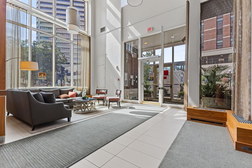 Set high on the 29th floor of Airye Tower, this corner-unit - photo 21