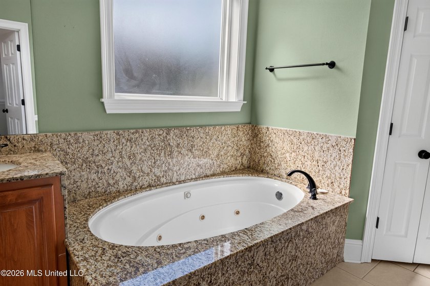 GORGEOUS JASSBY BUILT HOME WITH 4 BEDROOM AND 2.5 BATHS - photo 23