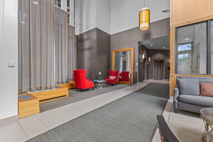 Set high on the 29th floor of Airye Tower, this corner-unit - photo 23