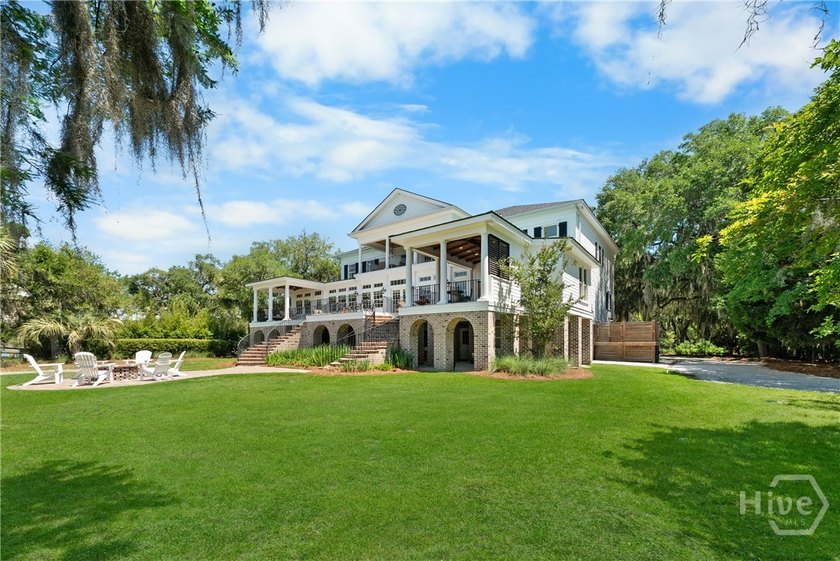 Rare offering Nestled beneath a canopy of ancient oaks draped in - photo 32