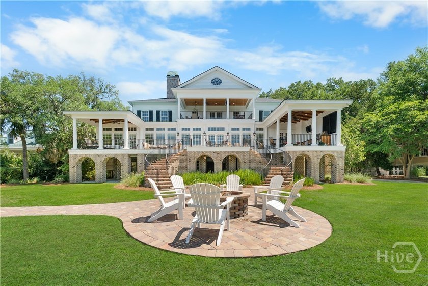 Rare offering Nestled beneath a canopy of ancient oaks draped in - photo 33