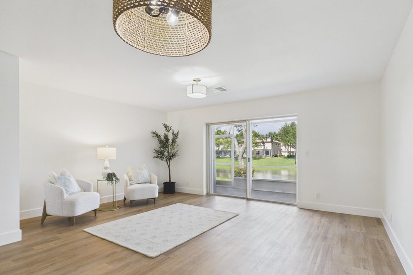 Nestled in the heart of Jupiter, this turnkey CBS townhouse has - photo 6
