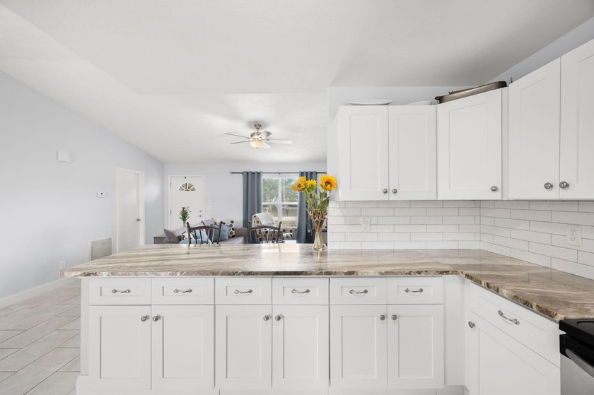 Welcome home to this beautifully updated 3-bedroom, 2-bathroom - photo 6