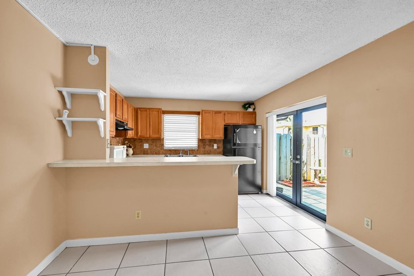 Welcome to this charming 2-bedroom, 1.5-bath townhouse featuring - photo 7