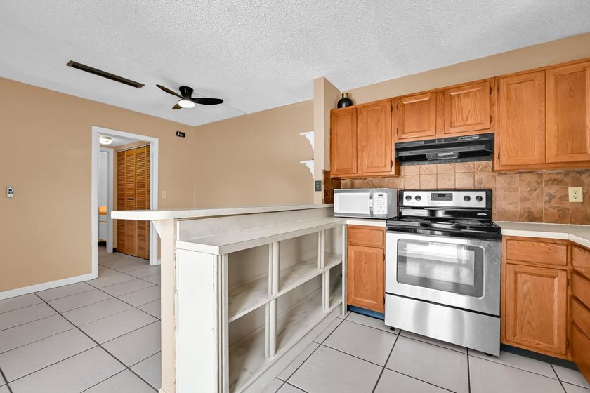 Welcome to this charming 2-bedroom, 1.5-bath townhouse featuring - photo 9
