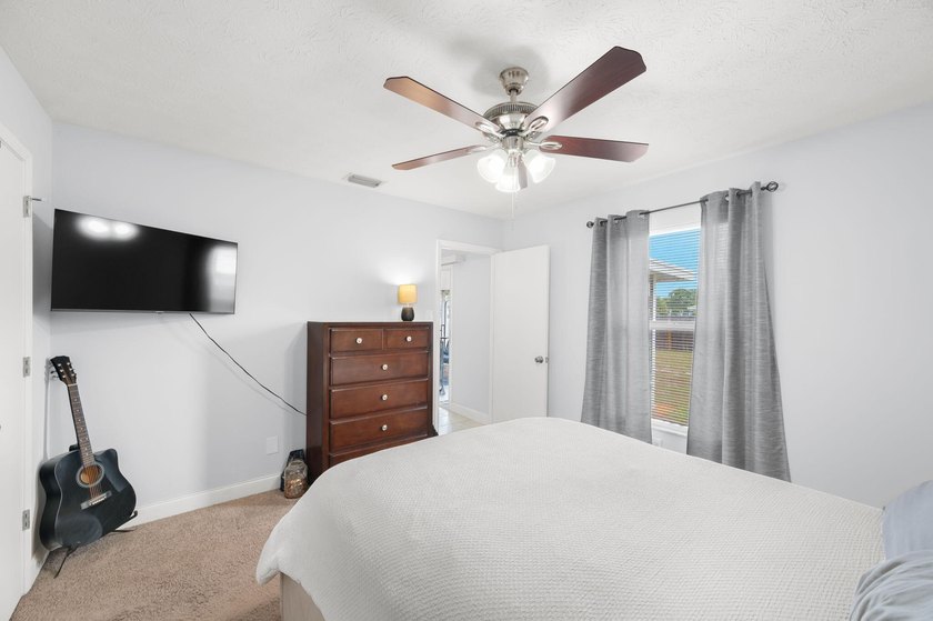 Welcome home to this beautifully updated 3-bedroom, 2-bathroom - photo 10