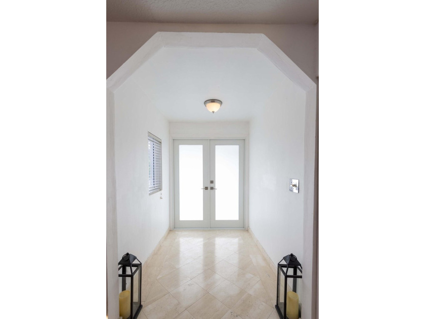 Nestled in the desirable community of Lake Clarke Shores, this - photo 4