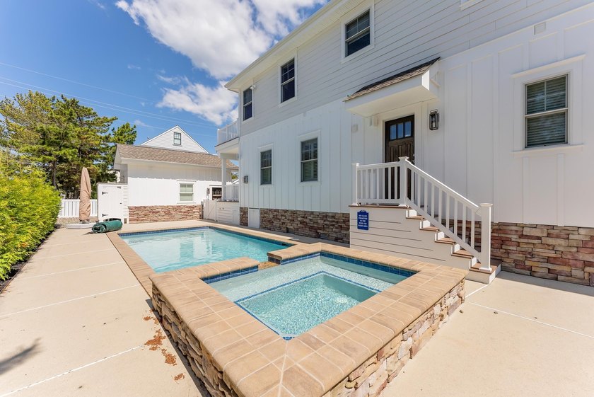 NEWLY RENOVATED!! - This Custom built four bedroom, three and - photo 3