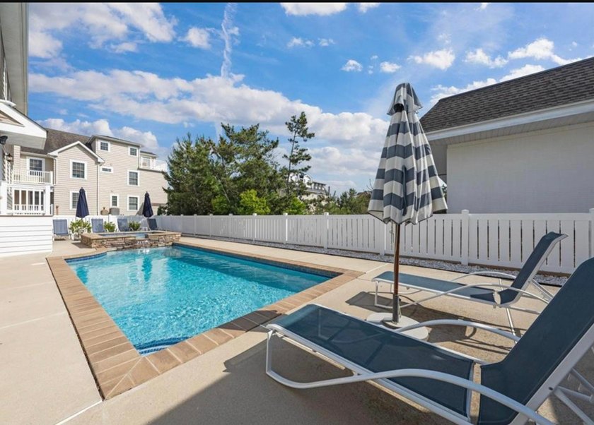NEWLY RENOVATED!! - This Custom built four bedroom, three and - photo 6